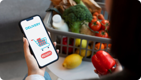 Warehouse worker scanning items with mobile device